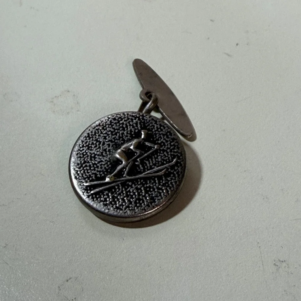 Vintage Silver Tone Downhill Skier Cufflink Single Round Textured Winter Sports